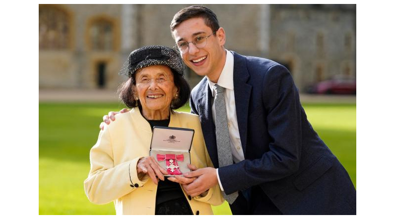 With her while she accepted the award was her great-grandson, 19-year-old Dov Forman.